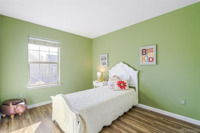 bedroom featuring wood-type flooring