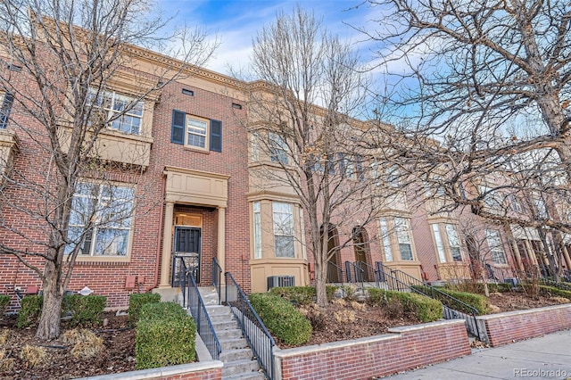 view of front of home featuring central air condition unit