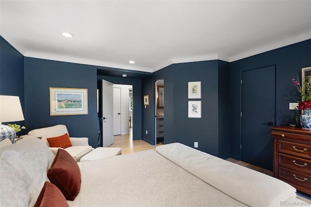 bedroom featuring light wood-style floors and recessed lighting