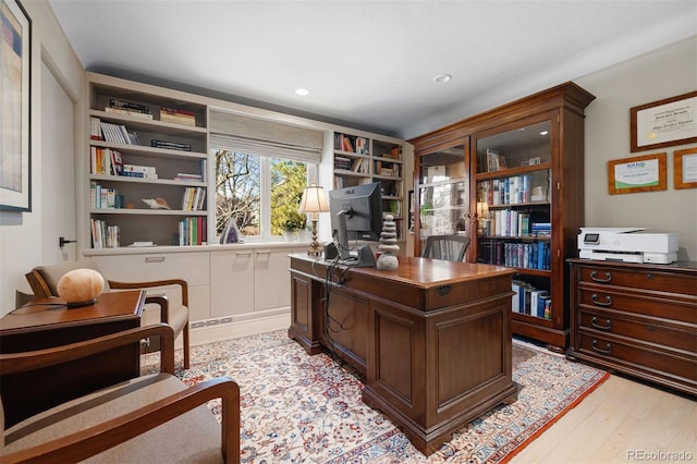 office area with light wood-type flooring, visible vents, and recessed lighting