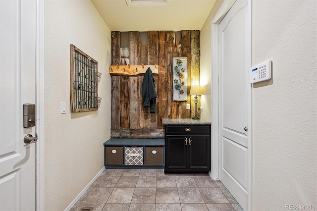 mudroom featuring baseboards