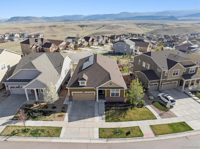 birds eye view of property featuring a residential view and a mountain view