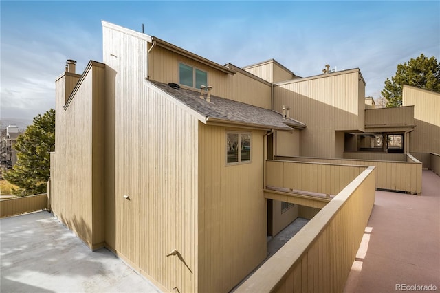 exterior space featuring a patio and a balcony