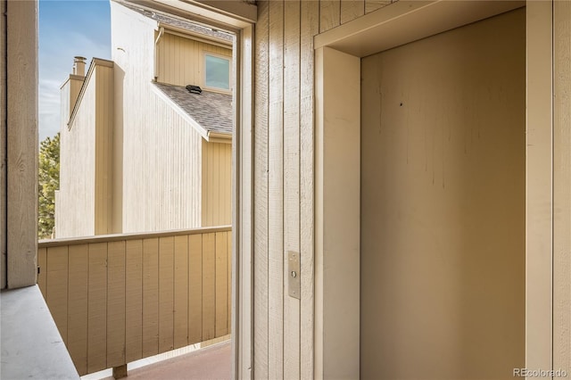 doorway to property featuring a balcony