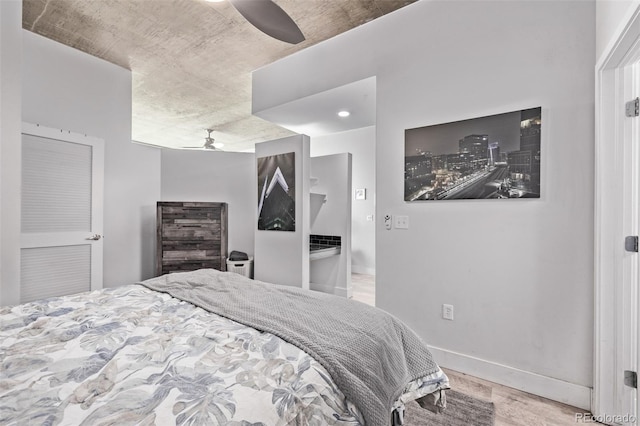 1700 Bassett St Unit 820, Denver, CO 80202 - bedroom with wood finished floors, ceiling fan, and baseboards
