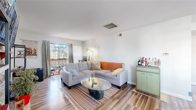 living room with hardwood / wood-style flooring