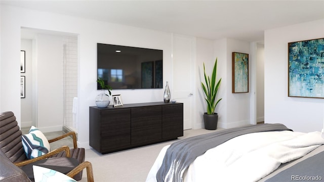 bedroom with light colored carpet and baseboards