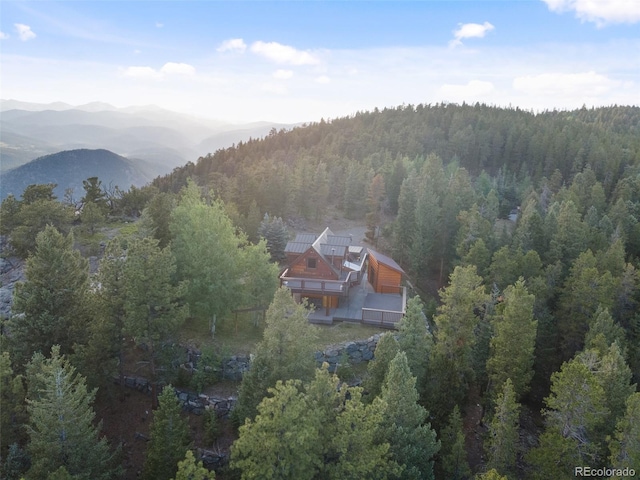 1000 Rangeview Ct, Black Hawk, CO 80422 - aerial view of property and surrounding area featuring a heavily wooded area and a mountain backdrop