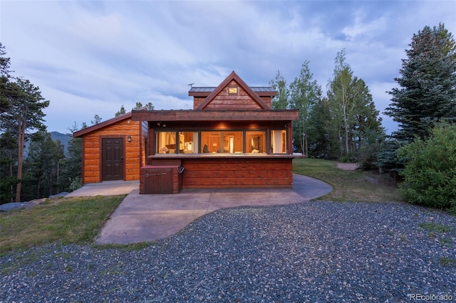 1000 Rangeview Ct, Black Hawk, CO 80422 - view of front of home featuring a standing seam roof, a metal roof, and a patio