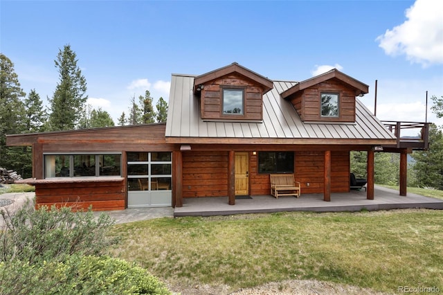 1000 Rangeview Ct, Black Hawk, CO 80422 - view of front facade with a front yard, a metal roof, and a standing seam roof