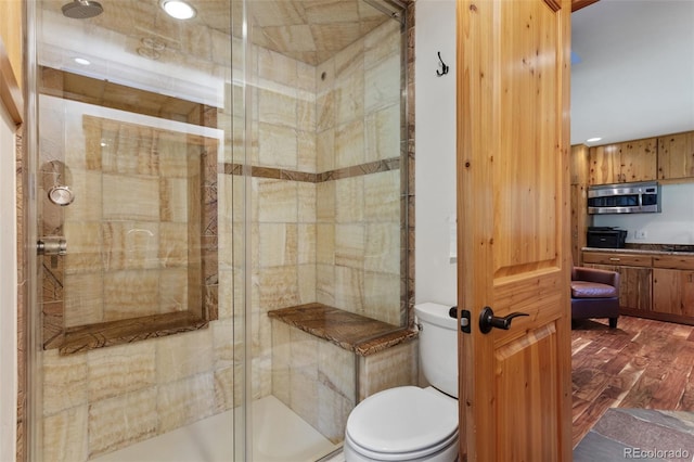 1000 Rangeview Ct, Black Hawk, CO 80422 - bathroom featuring a shower stall, wood finished floors, and recessed lighting
