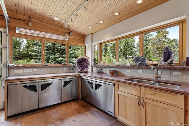1000 Rangeview Ct, Black Hawk, CO 80422 - kitchen featuring lofted ceiling, recessed lighting, light brown cabinets, dishwasher, and track lighting