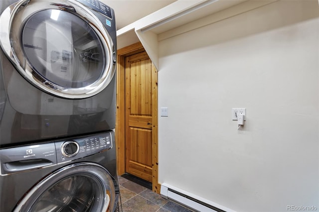 1000 Rangeview Ct, Black Hawk, CO 80422 - laundry room with stacked washer / drying machine and dark stone finish floors