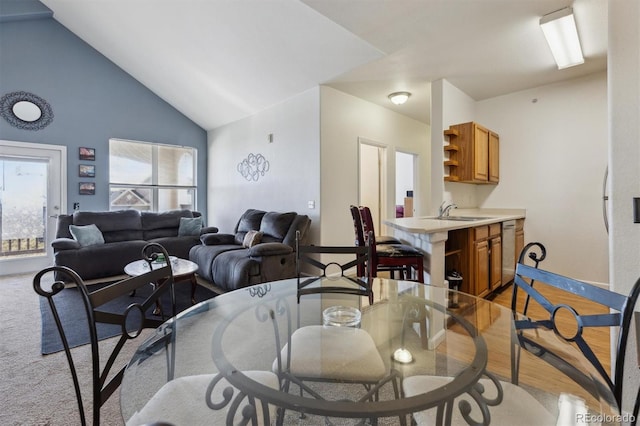 living room with high vaulted ceiling