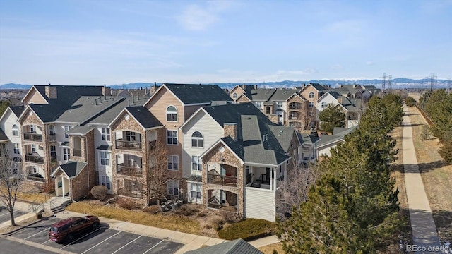 bird's eye view with a mountain view and a residential view