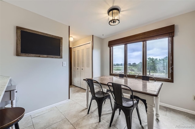 10397 Yates Ct, Westminster, CO 80031 - dining room with baseboards and light tile patterned floors