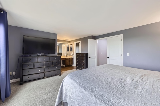 10397 Yates Ct, Westminster, CO 80031 - carpeted bedroom with ensuite bath and baseboards