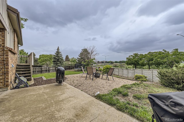 10397 Yates Ct, Westminster, CO 80031 - fenced backyard with a patio and a trampoline