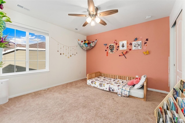 19316 W 84th Pl, Arvada, CO 80007 - carpeted bedroom featuring a closet and a ceiling fan