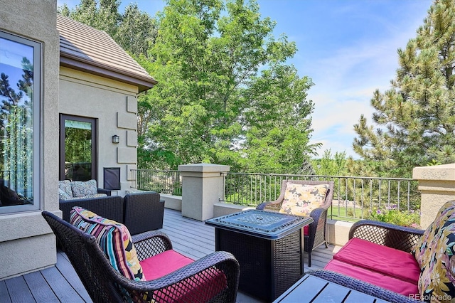 9065 E Lost Hill Trl, Lone Tree, CO 80124 - wooden deck featuring an outdoor hangout area