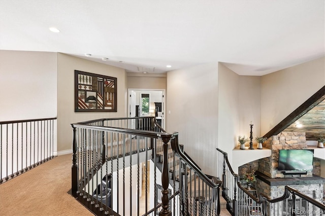 9065 E Lost Hill Trl, Lone Tree, CO 80124 - hall with an upstairs landing, carpet floors, and recessed lighting
