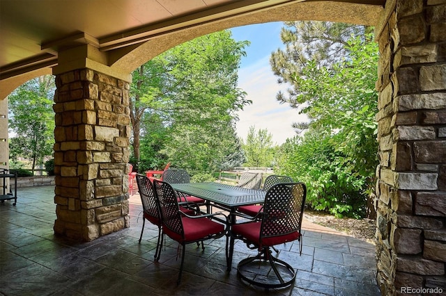9065 E Lost Hill Trl, Lone Tree, CO 80124 - view of patio / terrace featuring outdoor dining area