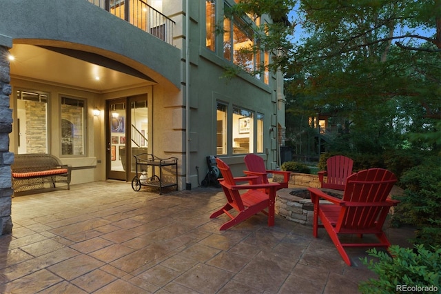 9065 E Lost Hill Trl, Lone Tree, CO 80124 - patio / terrace with a fire pit and a patio