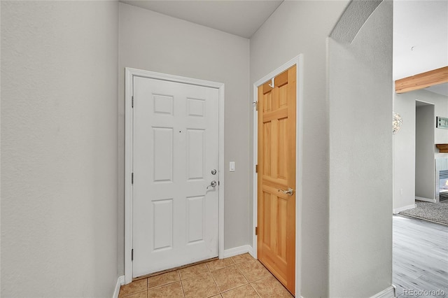 5220 Boardwalk Dr Unit A14, Fort Collins, CO 80525 - foyer entrance with baseboards and light tile patterned flooring
