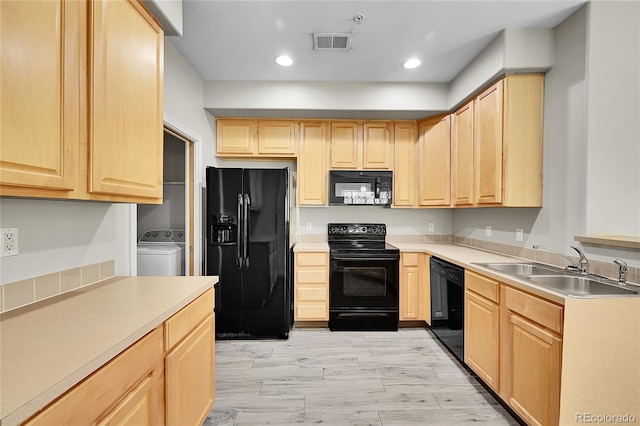5220 Boardwalk Dr Unit A14, Fort Collins, CO 80525 - kitchen with black appliances, washer / clothes dryer, light brown cabinetry, light countertops, and recessed lighting