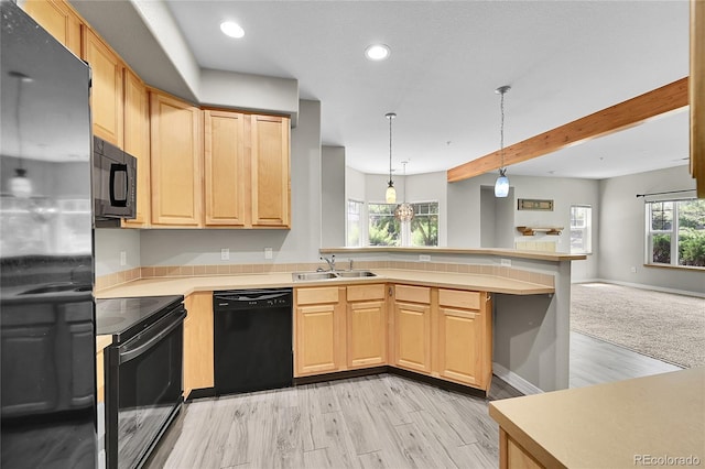 5220 Boardwalk Dr Unit A14, Fort Collins, CO 80525 - kitchen featuring black appliances, open floor plan, light countertops, recessed lighting, and beamed ceiling