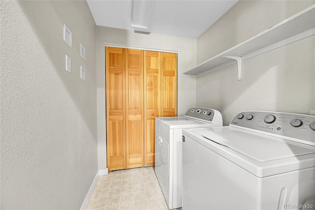 5220 Boardwalk Dr Unit A14, Fort Collins, CO 80525 - laundry area featuring washing machine and clothes dryer and baseboards