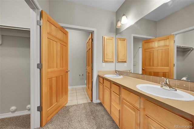 5220 Boardwalk Dr Unit A14, Fort Collins, CO 80525 - bathroom with double vanity and tile patterned flooring