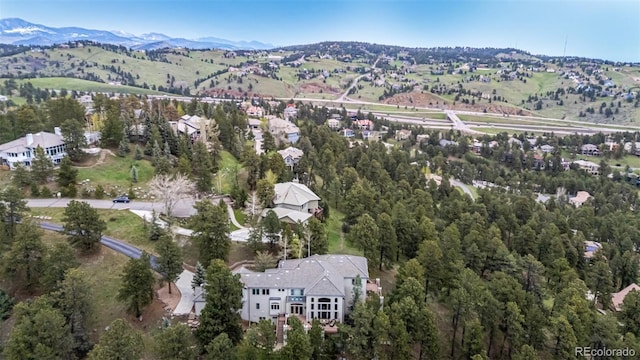 22554 Treetop Ln, Golden, CO 80401 - aerial overview of property's location featuring mountains