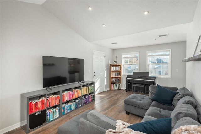 living room with lofted ceiling and wood-type flooring