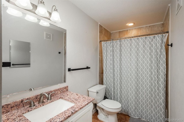 bathroom with vanity, a textured ceiling, toilet, and a shower with shower curtain