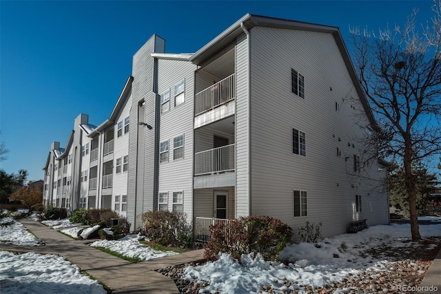 view of snow covered building