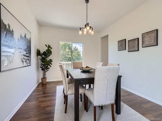 21770 Mount Elbert Pl, Parker, CO 80138 - dining room featuring dark wood-style flooring and a chandelier