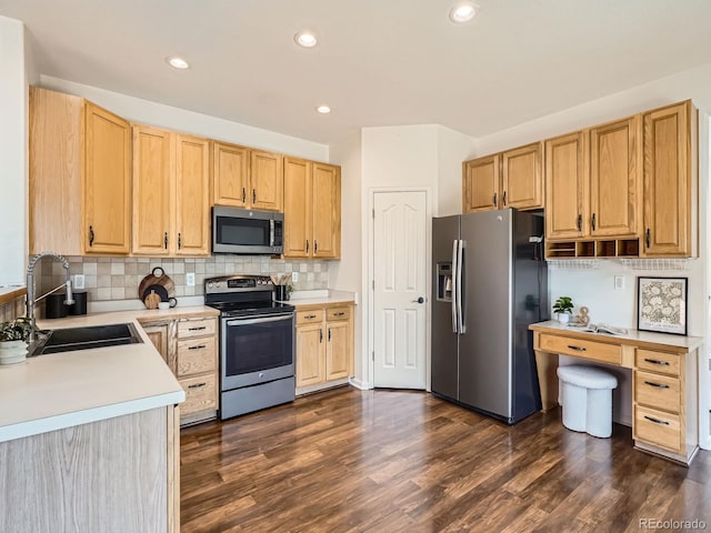 21770 Mount Elbert Pl, Parker, CO 80138 - kitchen featuring appliances with stainless steel finishes, light countertops, dark wood-style flooring, light brown cabinetry, and recessed lighting