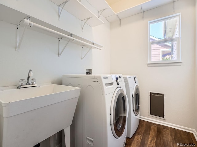 21770 Mount Elbert Pl, Parker, CO 80138 - washroom with washer and dryer and dark wood-type flooring