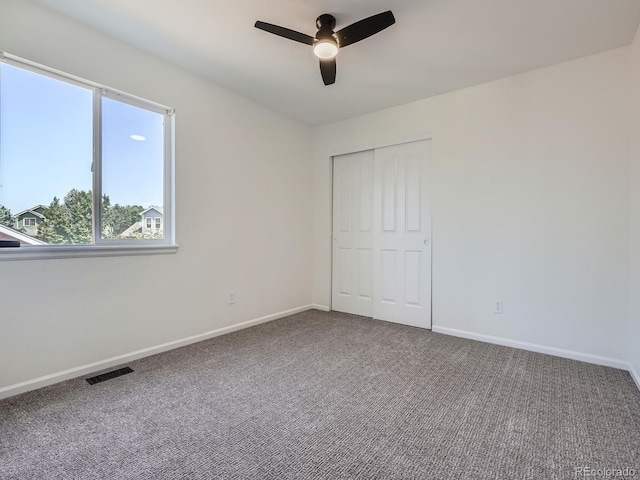 21770 Mount Elbert Pl, Parker, CO 80138 - unfurnished bedroom with carpet floors, a closet, and a ceiling fan