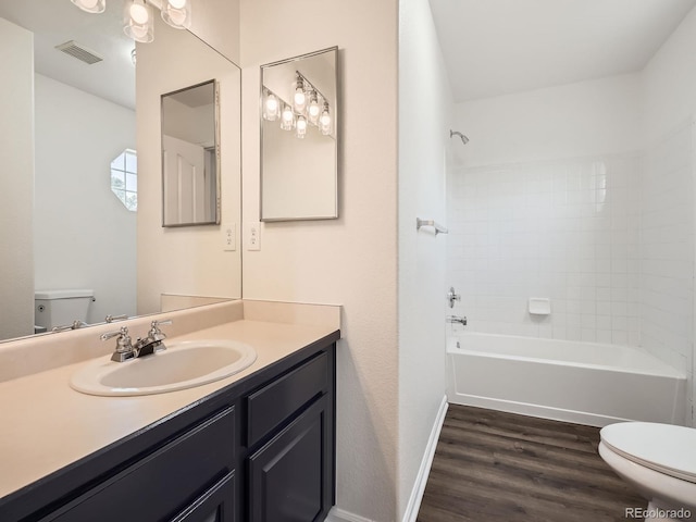 21770 Mount Elbert Pl, Parker, CO 80138 - bathroom featuring wood finished floors, vanity, and shower / tub combination