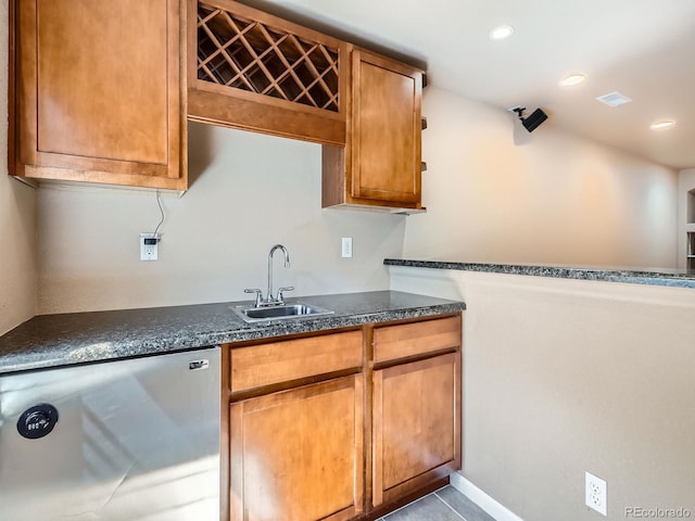 21770 Mount Elbert Pl, Parker, CO 80138 - kitchen with stainless steel dishwasher, recessed lighting, and brown cabinets