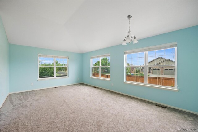 4732 S Coolidge St, Aurora, CO 80016 - carpeted empty room featuring a chandelier and lofted ceiling