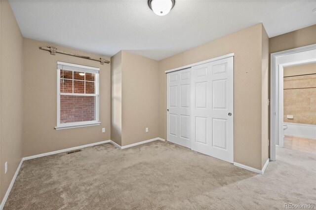 4732 S Coolidge St, Aurora, CO 80016 - unfurnished bedroom featuring a closet and carpet flooring