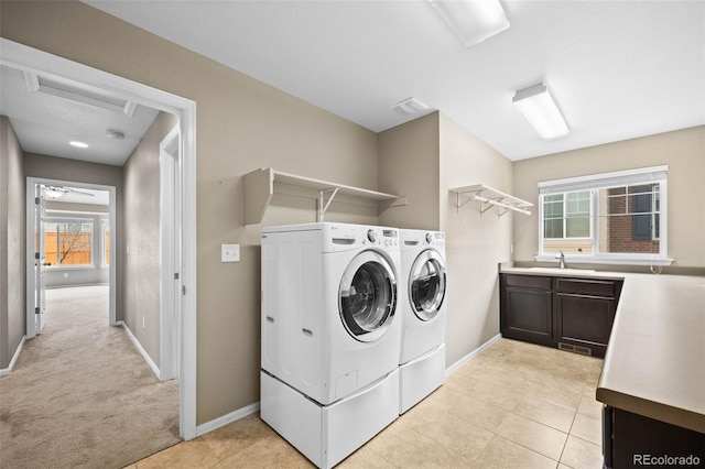 4732 S Coolidge St, Aurora, CO 80016 - washroom featuring washer and clothes dryer and light tile patterned floors