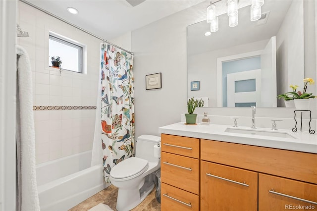 full bathroom with vanity, tile patterned floors, toilet, and shower / tub combo with curtain