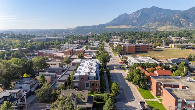 birds eye view of property with a mountain view