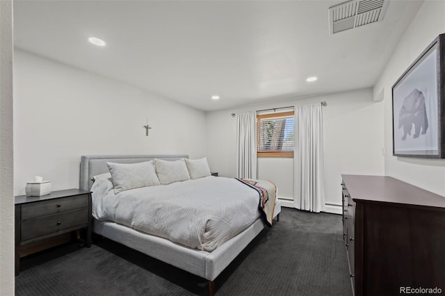 bedroom featuring dark colored carpet, visible vents, recessed lighting, and a baseboard radiator