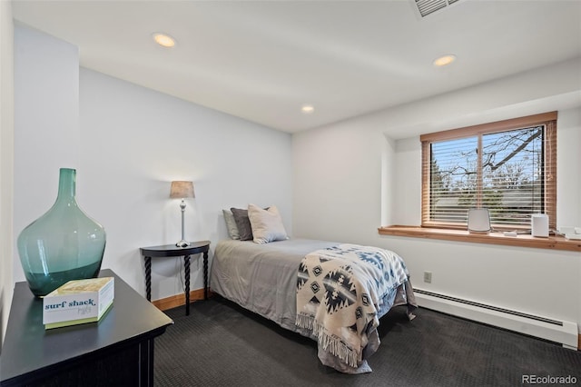 bedroom featuring visible vents, baseboards, recessed lighting, a baseboard heating unit, and dark carpet