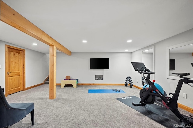 exercise area featuring carpet flooring, recessed lighting, and baseboards